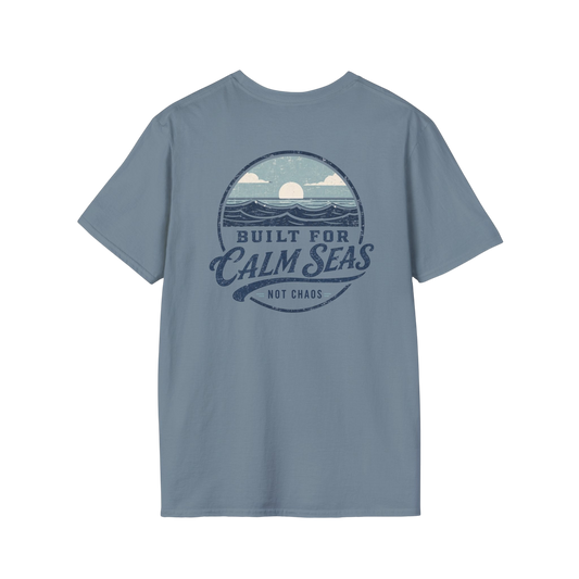 Au.Thentic.Tees blue cotton t-shirt featuring a vintage circular graphic of a sun over waves and calm seas text.